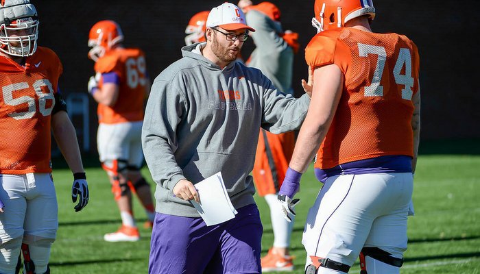 Austin works with the Clemson offensive line at practice last week 