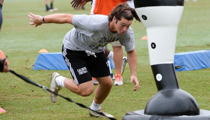 Spector works out at Swinney's camp last summer