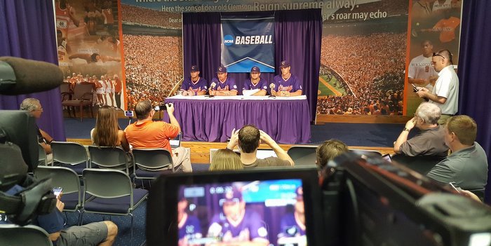 Monte Lee and players talk during Thursday's press conference 