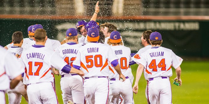 Clemson players celebrate with Jolly after the walk-off