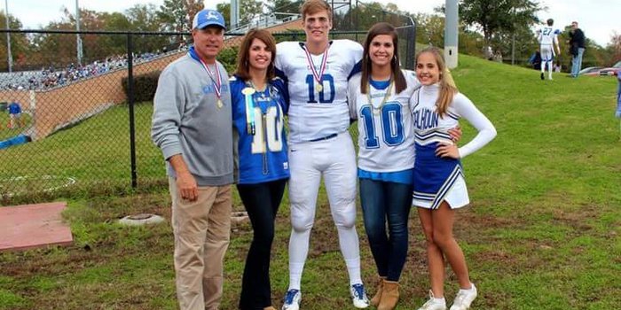 Spiers poses with his entire family after a game at Calhoun Academy