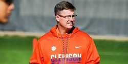 Conn hired, on the road recruiting as Swinney deals with staff questions