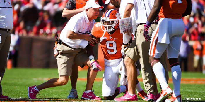 Gallman tries to stand after hit by NC State's Dravious Wright 