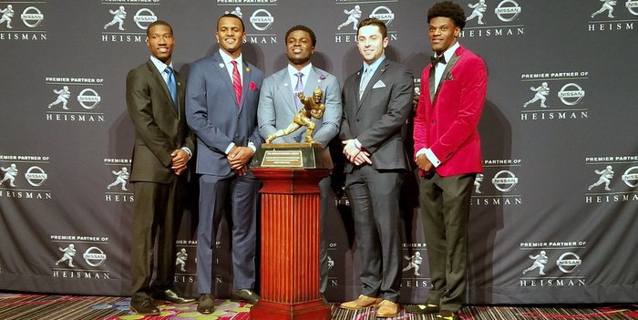 Watson and the finalists pose with the trophy 