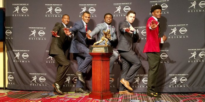 The five finalists pose with the trophy Saturday night 