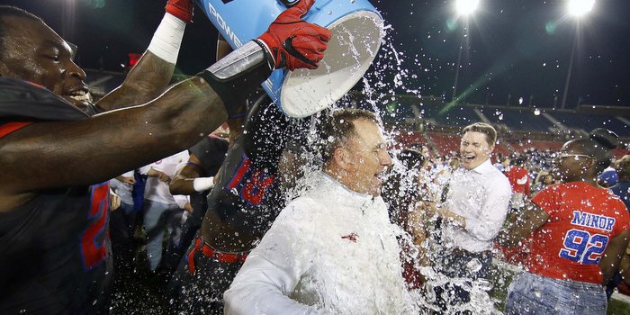 Morris gets a Gatorade bath after the win over Houston (Photo by Ray Carlin, USA Today)