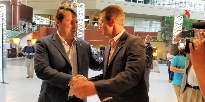 Swinney and Muschamp shake hands at Coaches for Charity fundraiser
