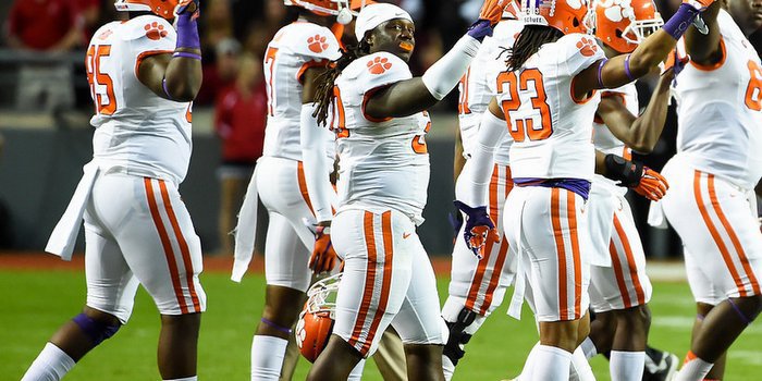 Williams celebrates with his teammates after the win over Auburn 
