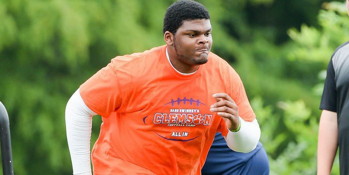 Salyer works out at Swinney's high school camp in June 