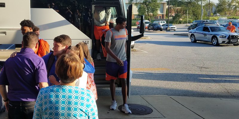 Grantham steps off the bus Friday evening in Clemson