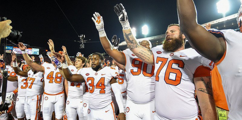Clemson players celebrate the win over Louisville 