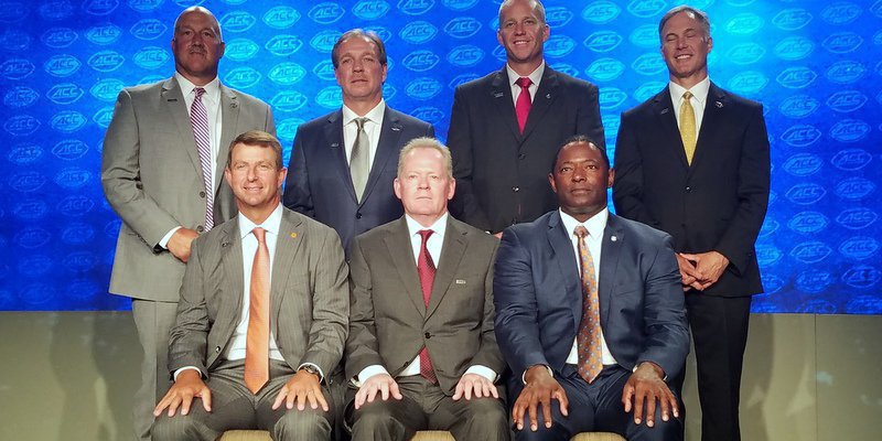 The ACC Atlantic Coaches pose Thursday afternoon