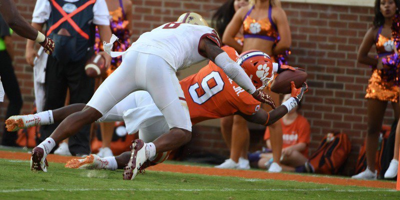 Etienne dives for the end zone late in the win over Boston College 