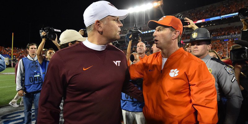 Justin Fuente (L) and Dabo Swinney after last year's ACC Championship (Photo by Jason Vinlove, USAT)
