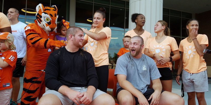 Blake Vinson and J.C. Chalk exchange a smile during Wednesday's head shaving