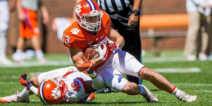 Hunter Renfrow: Holding babies and signing names