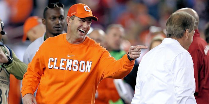 Dabo Swinney (L) and Nick Saban at the title game in January 