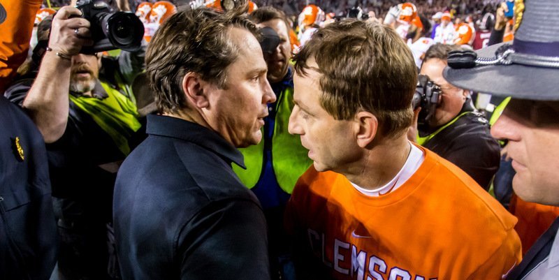 Swinney and Muschamp exchange a hug after Saturday's game (Photo by Jeff Blake, USAT)