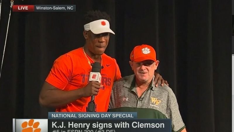 KJ Henry shares his moment with Coach Murphy 