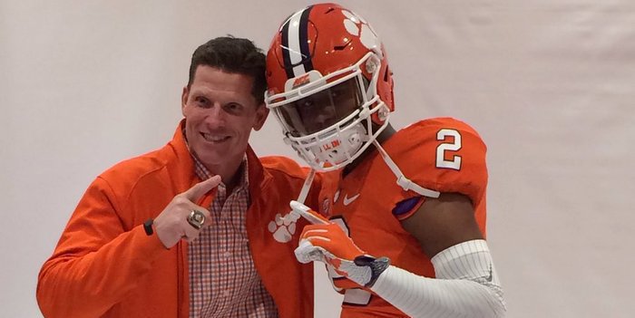 McMichael poses with Brent Venables last month 