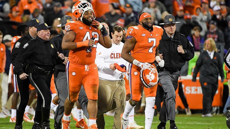 Christian Wilkins (42) and Austin Bryant (7) chose to return to Clemson