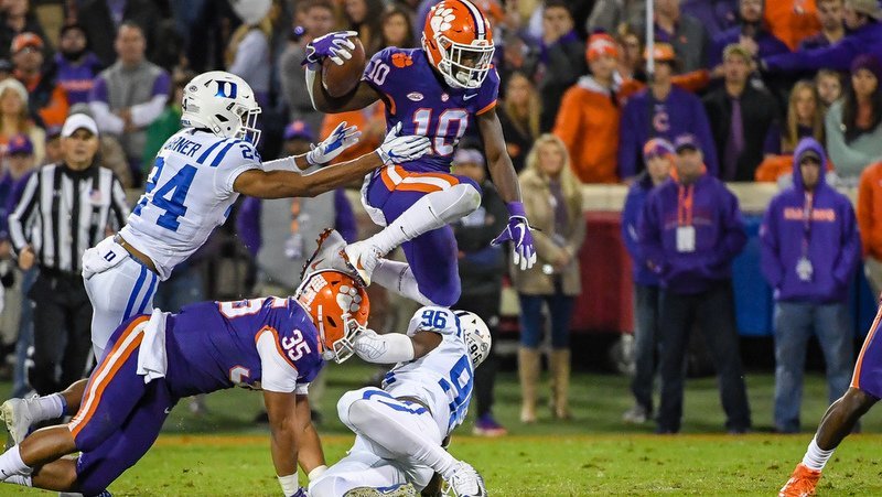 Derion Kendrick hurdles a Duke player in the first half 