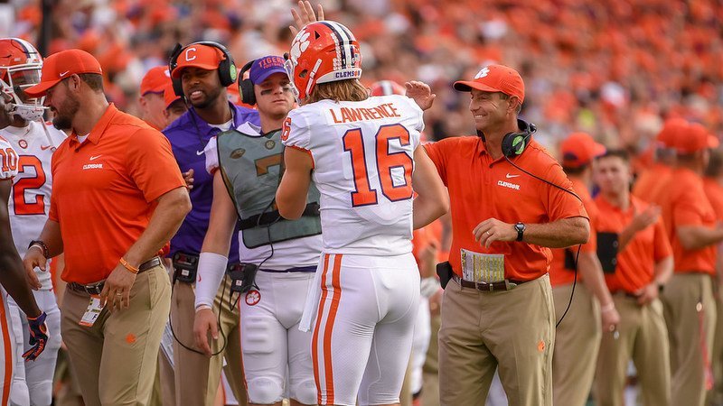 Swinney not ready to discuss QBs, but says Lawrence had his best game