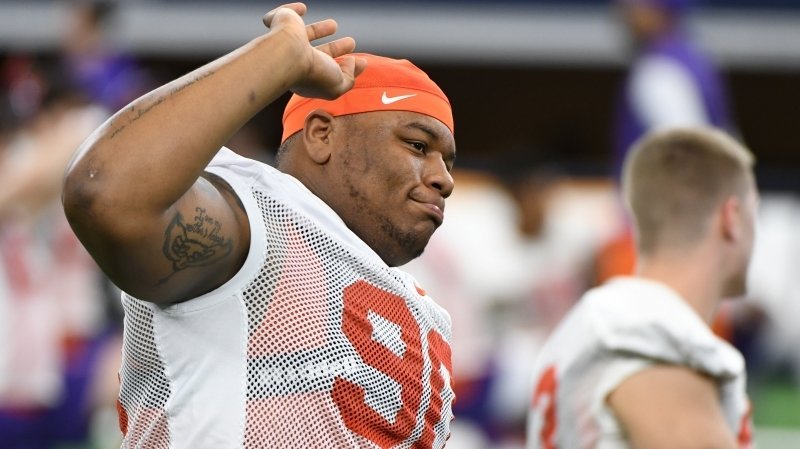 Dexter Lawrence stretches before Tuesday's Cotton Bowl practice 