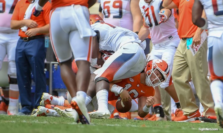 Swinney says he wishes Lawrence would have thrown the ball away 