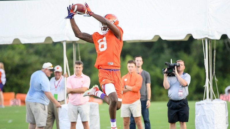 Justyn Ross makes a leaping catch during practice 