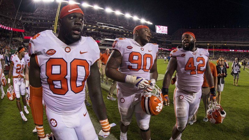 Clemson players walk off the field after the win over A&M (Photo by Jerome MIron, USAT)