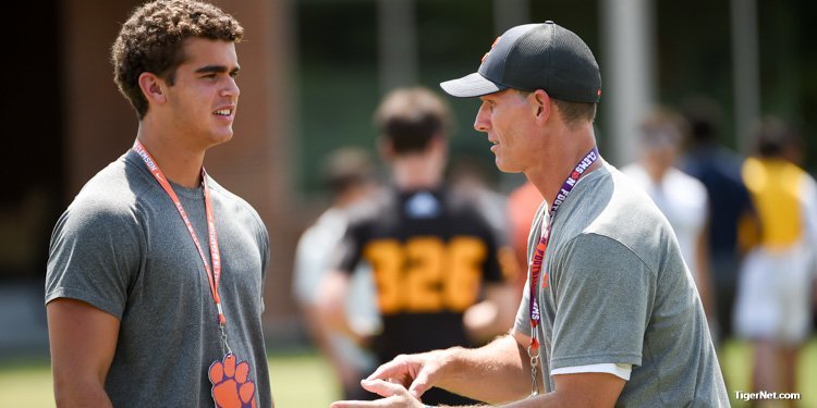 Lytle talks with Clemson defensive coordinator Brent Venables during camp this week 