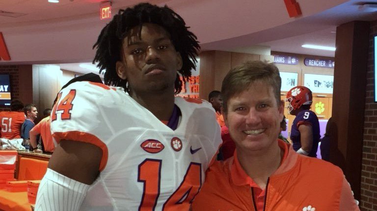 Kevin Swint poses with secondary coach and area recruiter Mickey Conn 