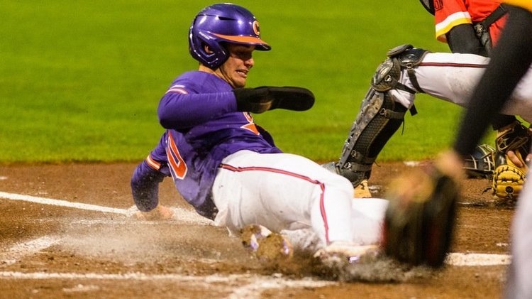 Sharpe slides home with the Tigers' first run (Photo by David Grooms)
