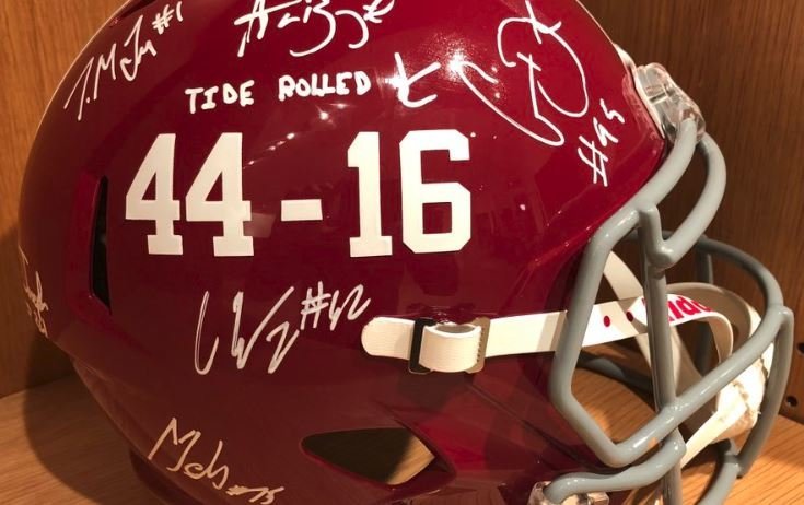 LOOK: Former Clemson players sign Alabama helmet 'Tide Rolled 44-16'