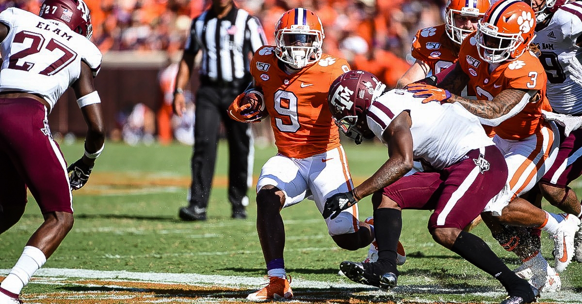 Travis Etienne looks for running room against Texas A&M