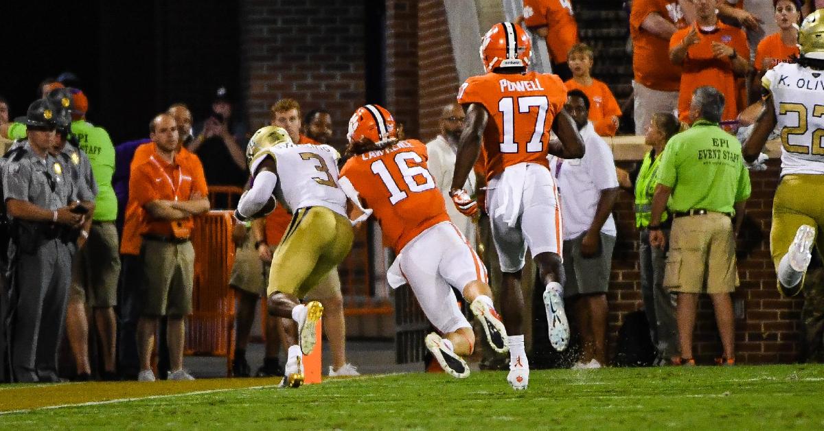 Trevor Lawrence shows the heart of a champion on tackle after interception