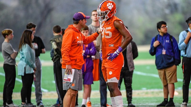 Swinney gives instructions to Jaelyn Lay at practice 