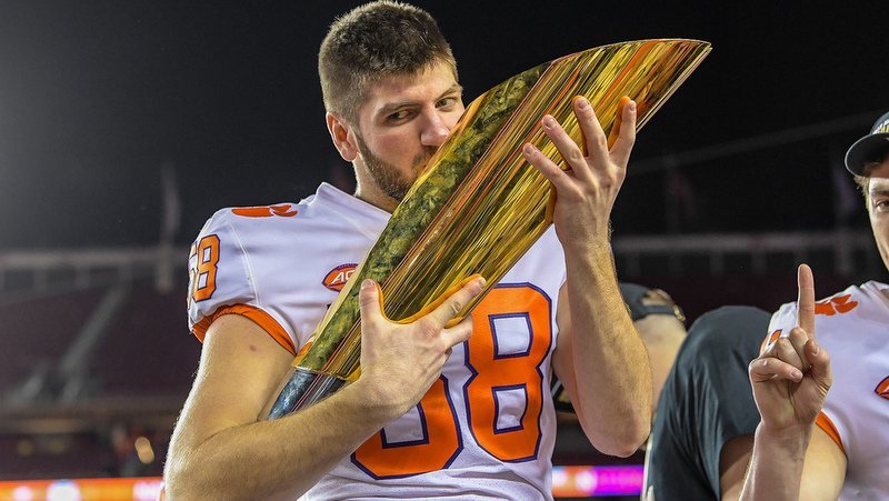 Phibbs kisses the National Championship trophy 