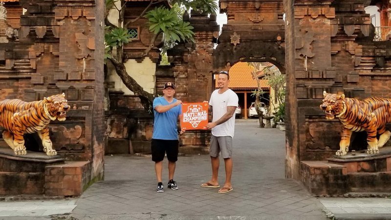 Showing off the Clemson flag at a temple in Bali 