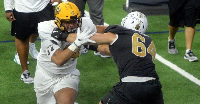 Bryan Bresee takes on an offensive lineman last week at The Opening Finals