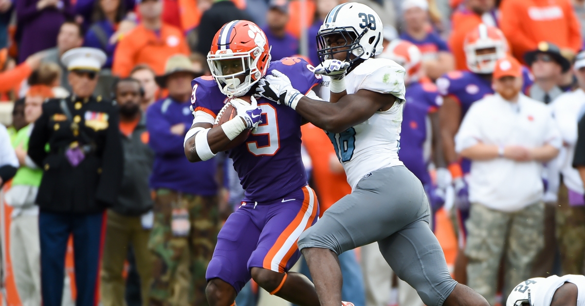 Travis Etienne carries a Bulldog defender in the 2017 game.