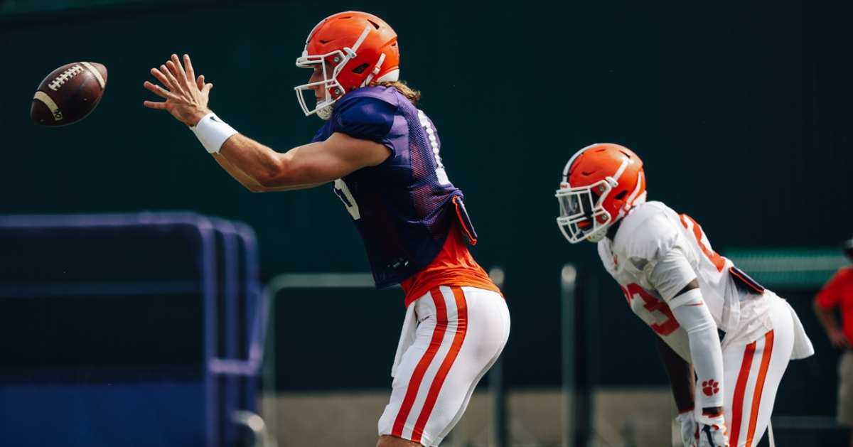 Trevor Lawrence takes a snap during practice. (Photo courtesy of CU Athletics)
