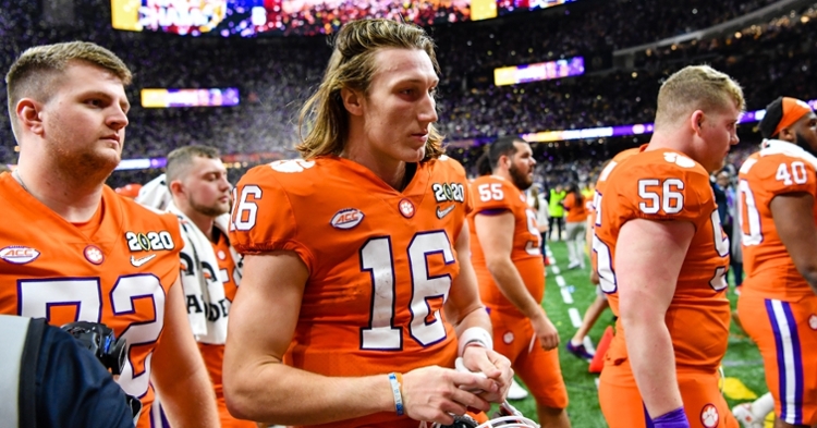 Trevor Lawrence walks off the field after the loss to LSU.