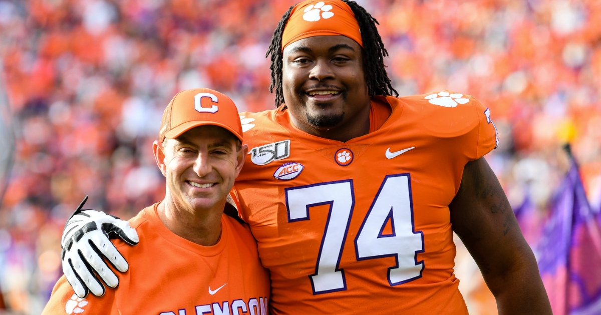 Simpson poses with Swinney before the game against Wake Forest. 