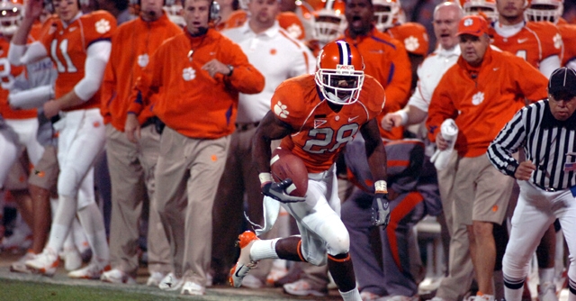 Swinney is in the background of this picture from that 2007 game, intensity for all to see.