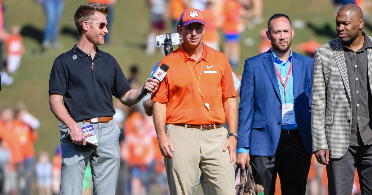 Swinney speaks with ESPN's Marty Smith during the spring game last year 