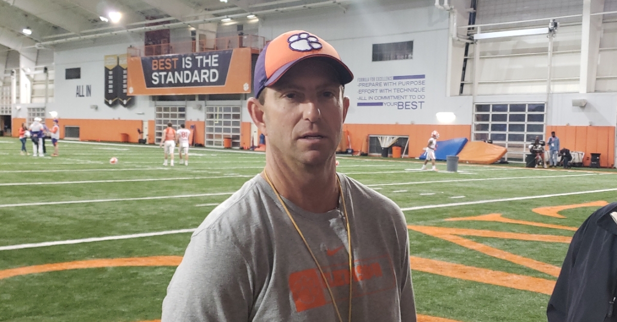Swinney speaks to the media after Friday's practice