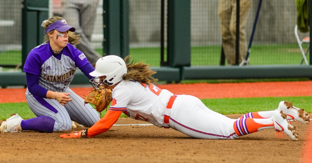 A Clemson runner is tagged out at third (Photo by David Grooms)