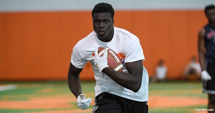 Ajou works out in the afternoon session of Dabo Swinney's camp in June.